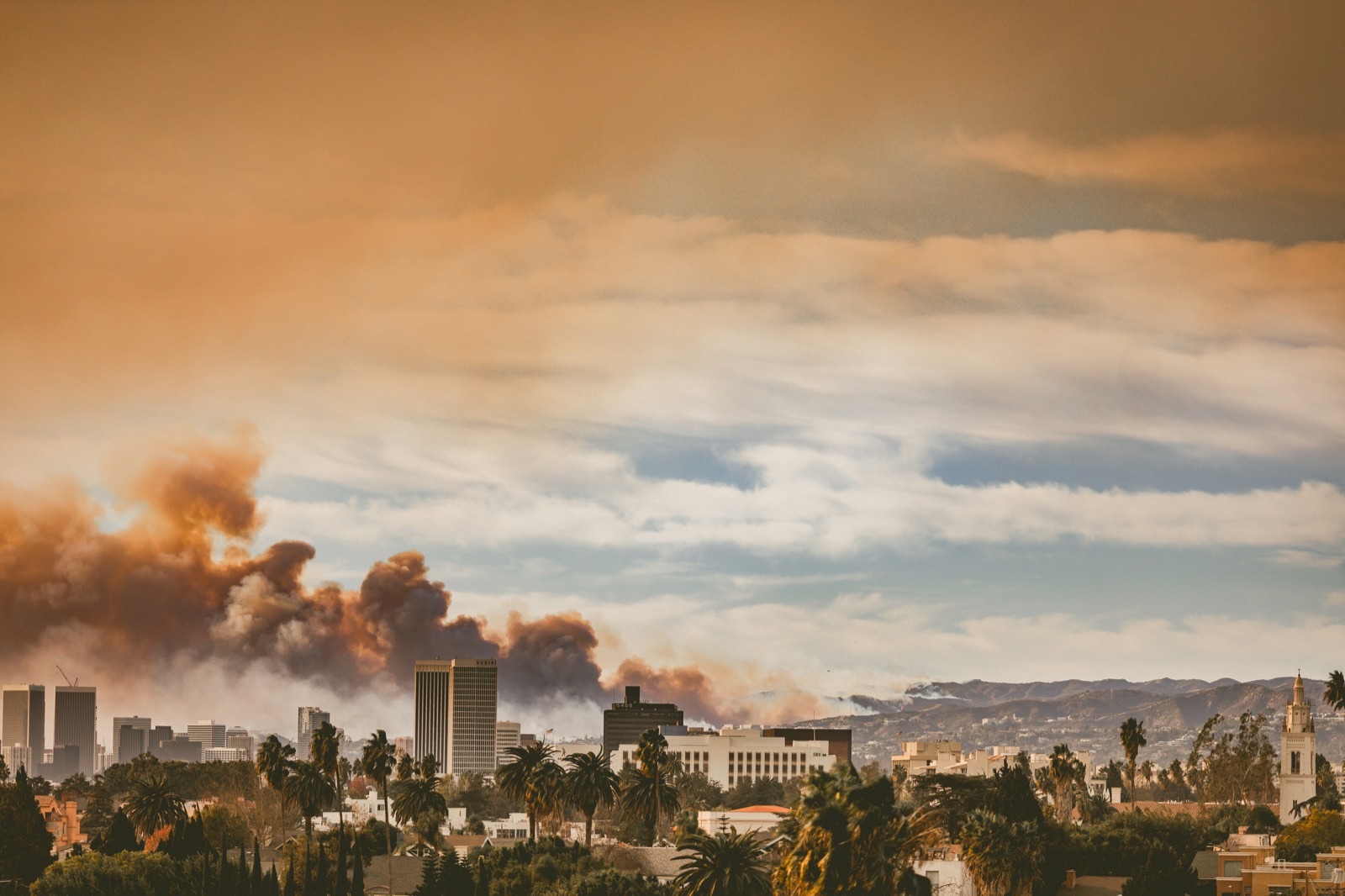 A city with a lot of smoke coming out of it