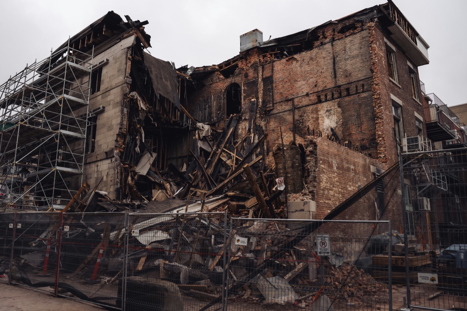 A damaged building is partially collapsed