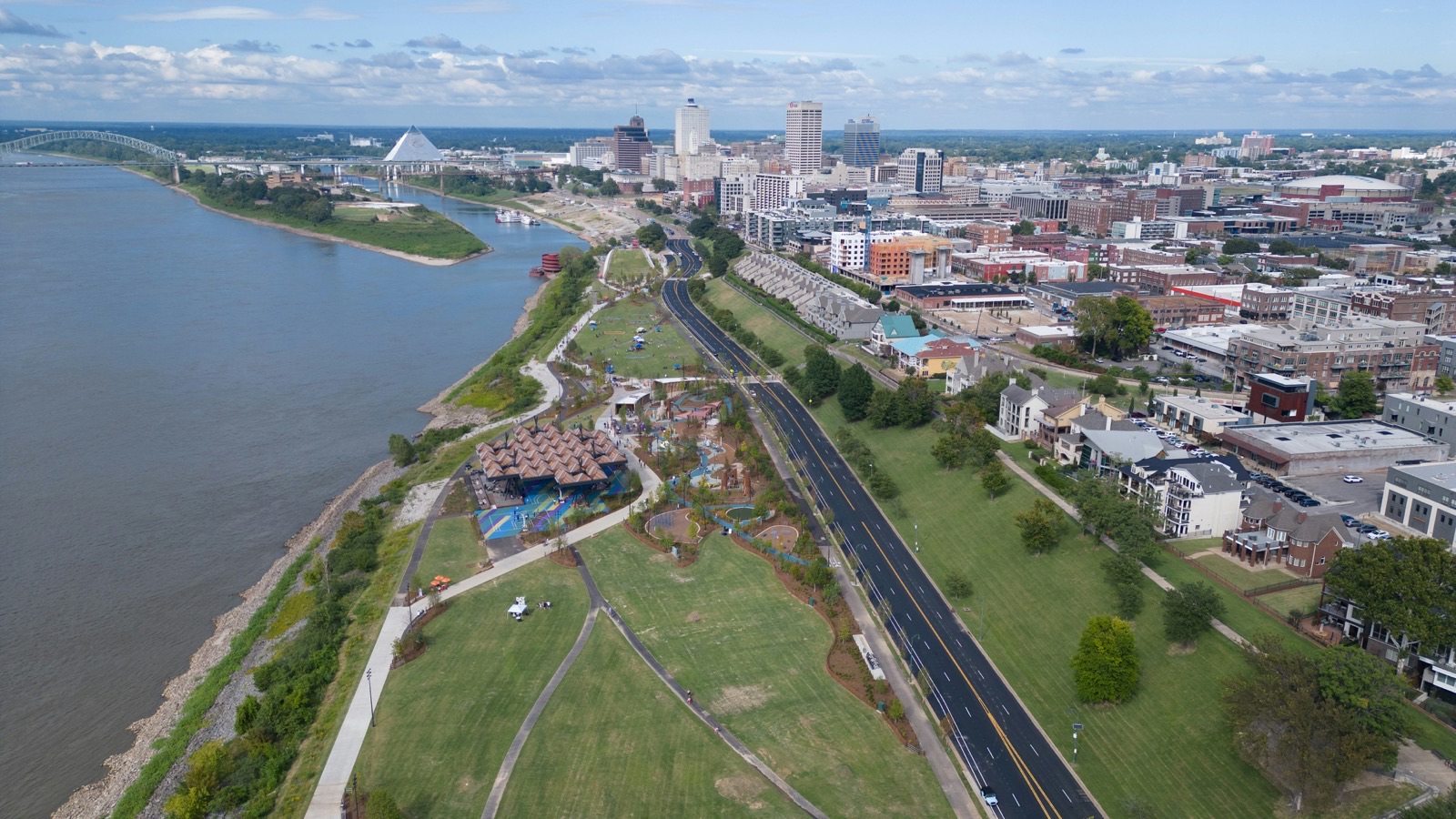 an aerial view of a city with a river running through it